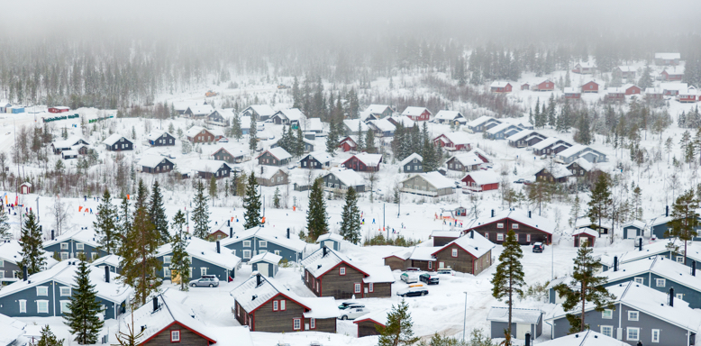 A quaint winter village nestled in the mountain